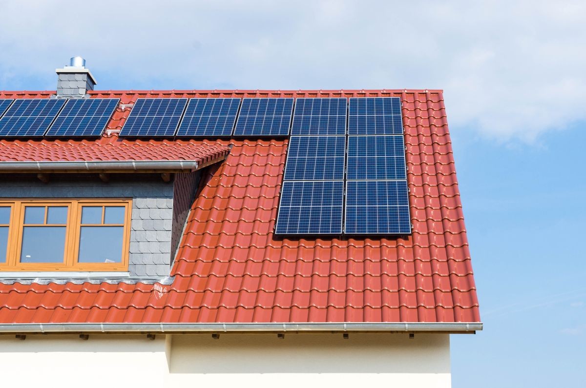 roof of a house with solar panels or photovoltaic plant